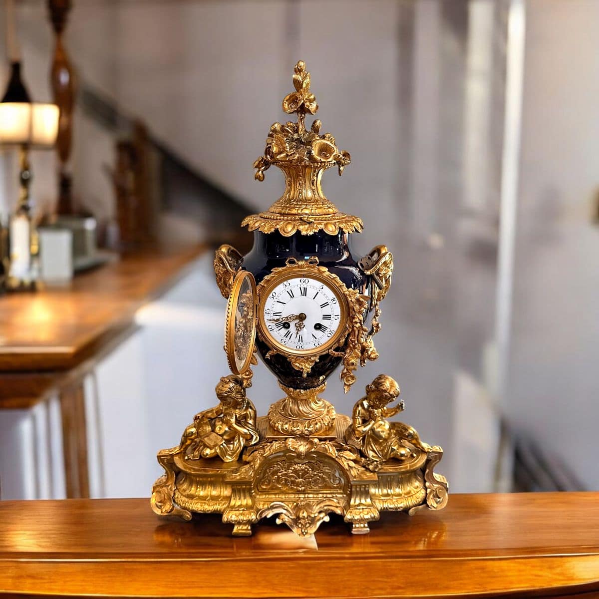 French Napoleon III Ormolu-Mounted Cobalt Blue Porcelain Mantel Clock with Putti Figures, Late 19th Century