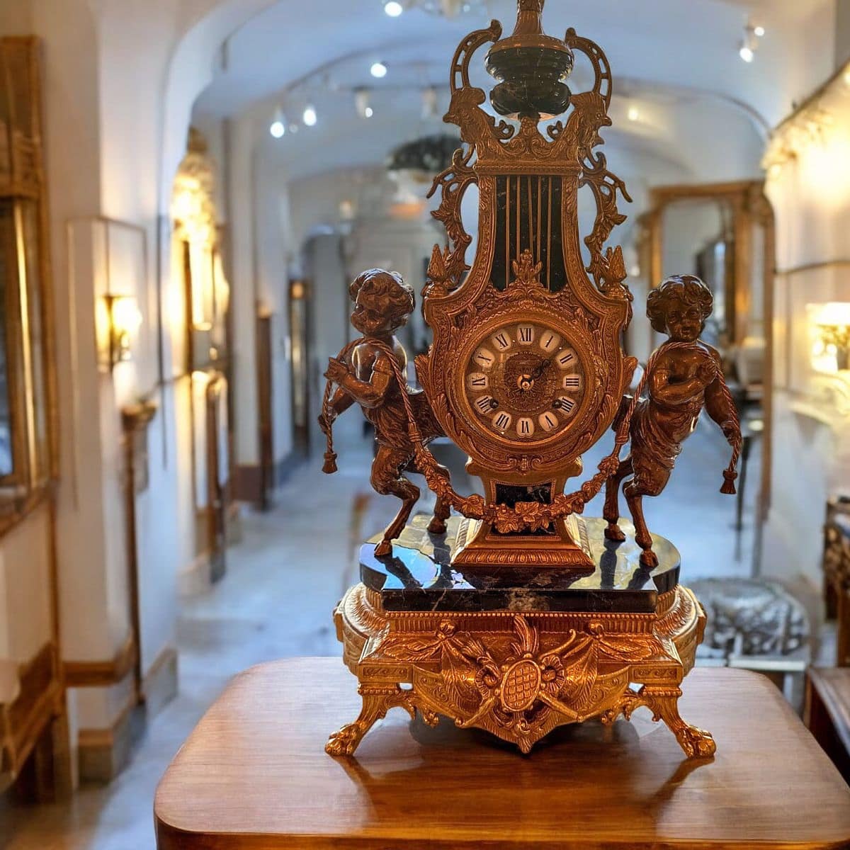 Imperial Italian Gilt Spelter & Black Marble Lyre-Form Mantel Clock with Flanking Putti Figures | Mid-Century Rococo Revival | 24"